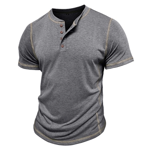 Macro view of grey Henley shirt showing three-button collar and contrast stitching details