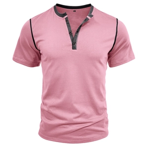 Detail of pink men's Henley shirt showing black contrast collar and three-button placket
