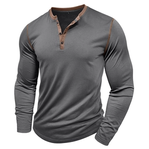 Close-up of contrast brown stitching and 3-button placket on grey long sleeve Henley shirt