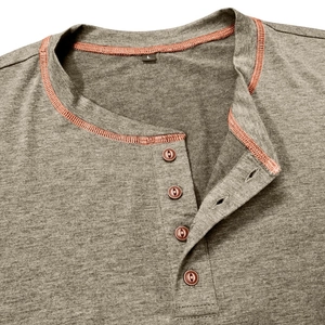 Detail shot of men's Henley shirt collar with four buttons and contrast red stitching