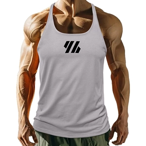 Detailed close-up of light gray men's gym vest featuring black geometric logo and deep armholes