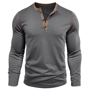 Detail view of men's Henley shirt with brown contrast collar and three buttons