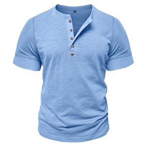 Detail of light blue slub cotton Henley shirt with five wooden buttons and XL size label
