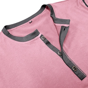 Detail of dark pink Henley t-shirt featuring grey contrast collar and buttoned placket