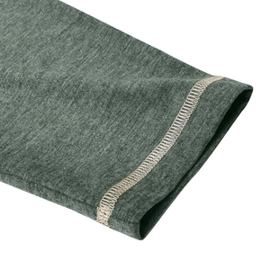 Macro detail of dark green knitted long sleeve polo cuff with cream contrast stitching