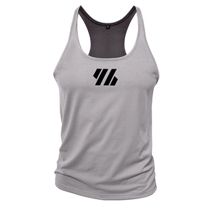 Detail view of light grey men's training vest featuring racerback design and black chest logo