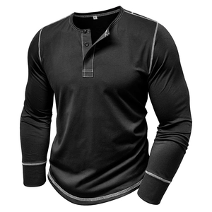 Detail of men's Henley shirt showing black fabric with white contrast stitching and buttons