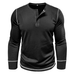 Close-up of black Henley shirt showing three-button placket and white contrast stitching detail