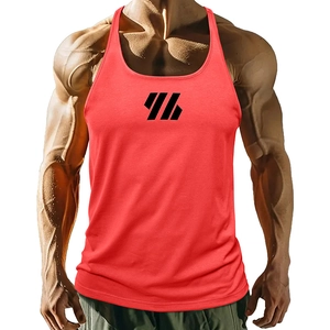 Detail of red athletic tank top featuring Y-back design and black geometric chest logo