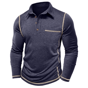 Detail of dark gray men's polo shirt with cream contrast stitching and wood buttons
