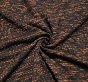 Close-up of dual-tone knit fabric texture in dark brown and orange melange for shirts