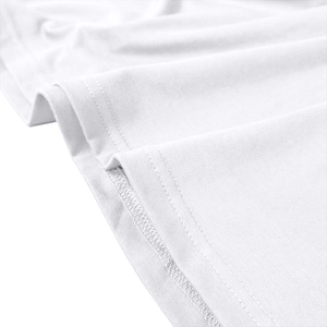 Macro detail of the double-needle hem and precise stitching on a white cotton polo shirt