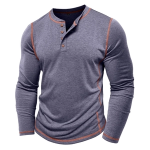 Detail of grey Henley shirt with four-button collar and orange contrast stitching