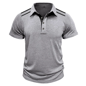 Detailed view of gray polo shirt with black contrast collar and three-button placket