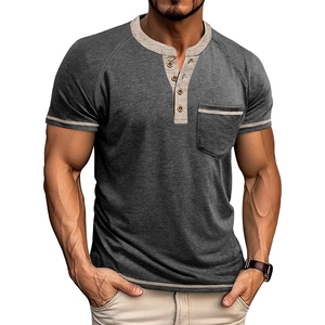 Detailed view of grey Henley shirt with khaki contrast trim on sleeves and pocket