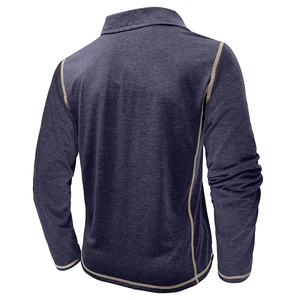 Detail view of long-sleeve polo shirt featuring contrast stitching and knit texture