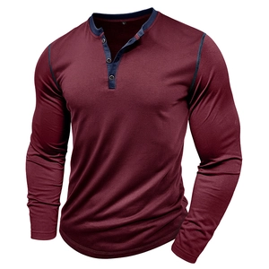 Detail of burgundy long sleeve Henley shirt with navy contrast stitching and three-button placket