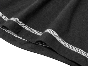 Macro shot of durable contrast stitching on the black jersey hem of a henley shirt