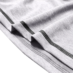 Detail shot of the precise double-needle stitching and hem of the men's tactical hoodie