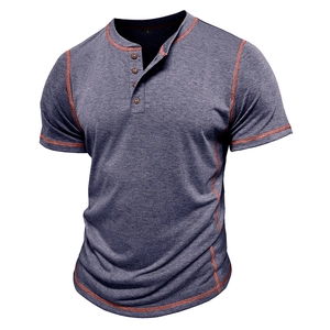 Detail of Henley shirt collar with four buttons and contrast orange stitching on purple fabric