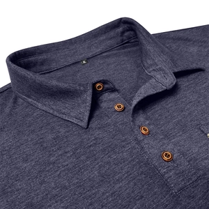 Close-up of knit fabric texture and four-button collar on a dark grey long sleeve polo shirt