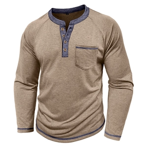 Detail of khaki Henley shirt with navy contrast binding and three wooden buttons