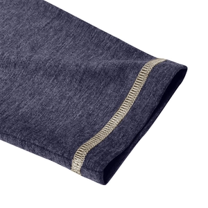 Detailed macro view of dark grey knitted polo sleeve with gold contrast stitching