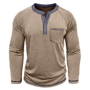 Detail of khaki Henley shirt with navy contrast collar and three wooden buttons