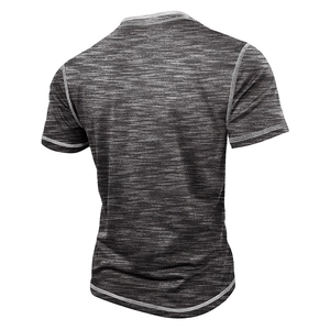 Detail view of heather grey t-shirt back with white contrast stitching and fabric texture