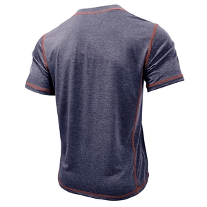 Detail of men's short sleeve Henley shirt with orange contrast flatlock stitching
