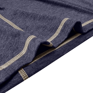 Detail of premium contrast flatlock stitching on dark purple textured men's knit polo shirt