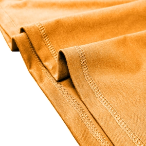 Detailed close-up of bright orange knitted fabric with professional double-needle stitching