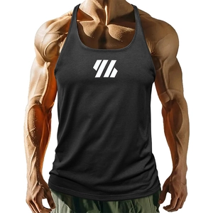 Close-up of black stringer tank top with white logo showing breathable fabric and thin straps