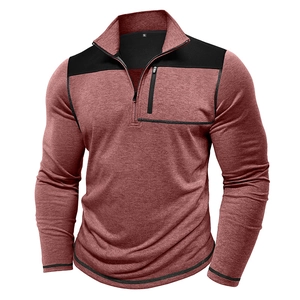 Detail of men's quarter-zip sweatshirt in red and black with ribbed knit texture