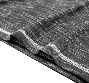 Close-up of heather gray knit fabric with professional double stitching for men's shirts