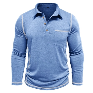 Detail of light blue long sleeve polo shirt with wood buttons and white contrast stitching