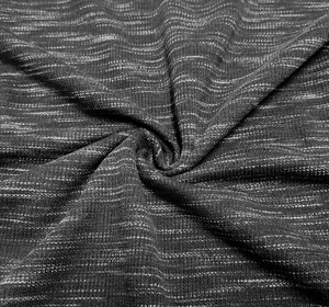 Detail of grey marl knitted fabric texture with fine horizontal stitch pattern