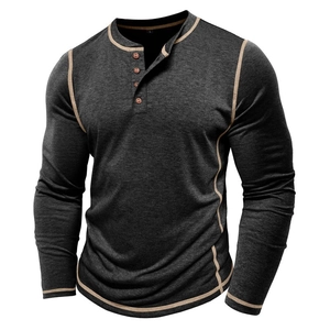 Detail of dark heather grey Henley shirt featuring four wood-grain buttons and contrast seams