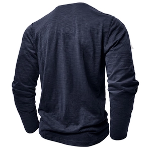 Back view of navy blue long sleeve Henley shirt showing slub cotton fabric texture