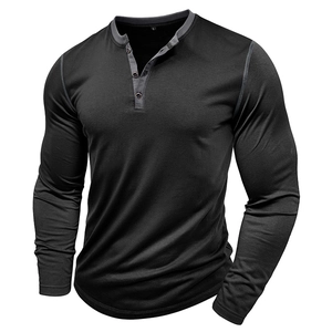Detail of the grey ribbed Henley collar and three-button placket on black long sleeve shirt