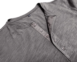 Close-up of grey Henley T-shirt neckline with five buttons and woven size label