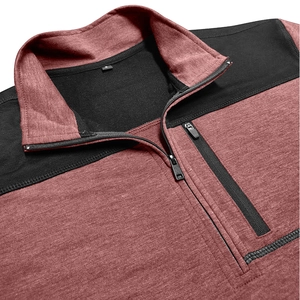 Detail of the stand-up collar and vertical zipper pocket on the burgundy tactical sweatshirt