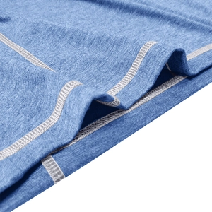 Detailed close-up showing flatlock stitching and grey-blue knit fabric on men's polo shirt