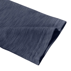 Close-up of deep blue slub cotton texture and durable double-needle stitched cuff edge