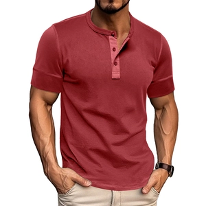 Close-up of brick red muscle fit Henley shirt with three-button placket and durable seams