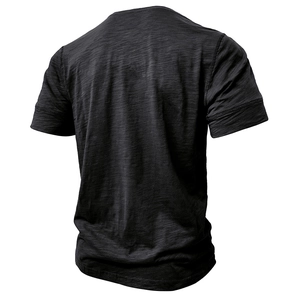 Back view of black men's Henley shirt featuring textured slub cotton fabric details