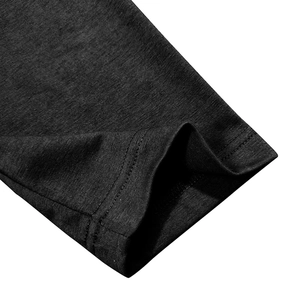 Detailed close-up of dark grey heather knit fabric with neat twin-needle stitching finish