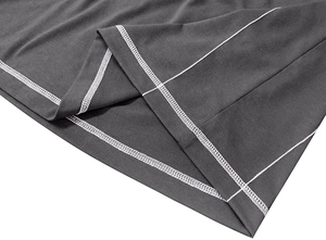 Detailed close-up of dark grey knit shirt sleeve with white contrast stitching
