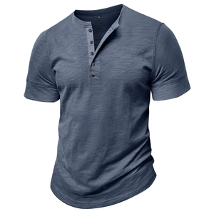 Close-up of a blue men's Henley shirt showing the four-button placket and textured fabric