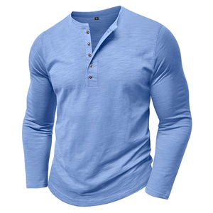 Detailed view of the light blue Henley collar with three buttons and knit texture